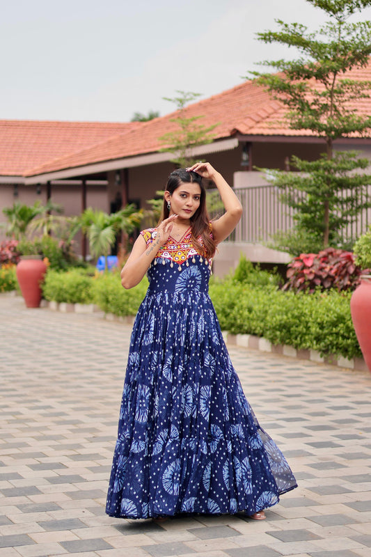 Celebrate The Spirit Of Navratri In This Vibrant Faux Georgette Gamthi Work Gowns